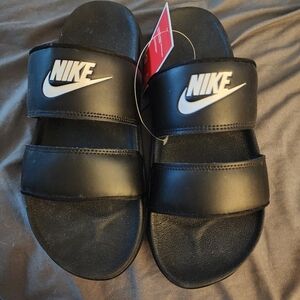 Nike Black Slide Sandals with White Logo